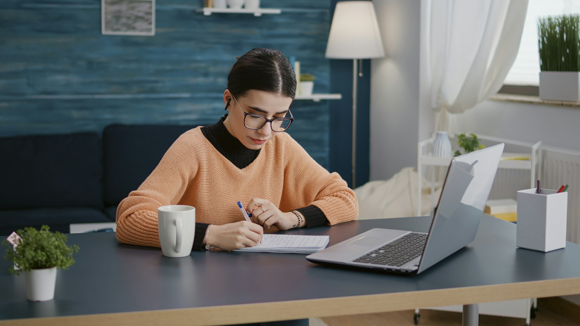 Female student attending online lesson on videoconference Student attending online tutoring session, tutor teaching via Zoom, online learning environment