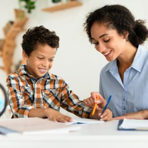 Student receiving personalized tutoring, improved grades with tutoring, confident student learning