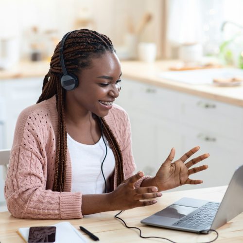 Online Tutoring. Black Female Teacher In Headset Having Virtual Lesson With Students Online Tutoring. Black Female Teacher In Headset Having Virtual Lesson With Students