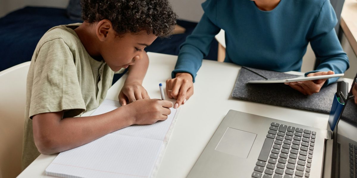 Tutor helping boy with school subject Tutor helping boy with school subject So, what age is best to get a tutor?